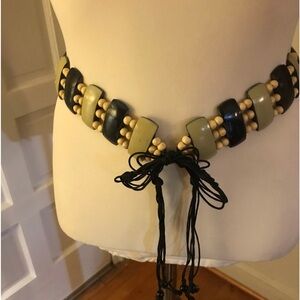 Unique Self tie belt made of wooden beads.
